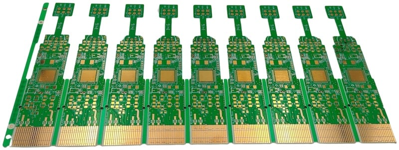 An array of rigid PCBs ready for component assembly.